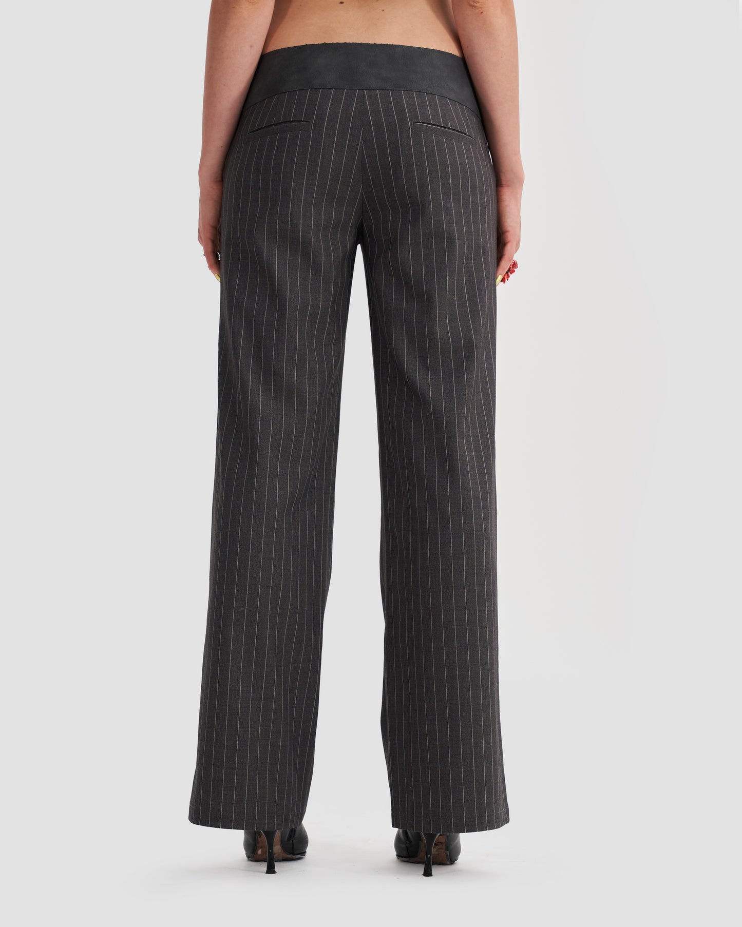 Low-Rise Tailored Pinstripe Trousers with Buckle in Dark Grey – Heretic ...