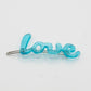 Blue 'Love' Hair Clip - Bad Handwriting